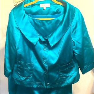 Badgley Mischa is a vibrant teal two-piece ensemble a shiny, satin-like fabric